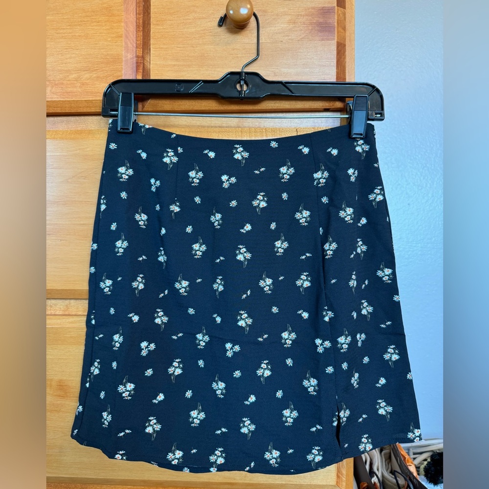 Black floral mini skirt